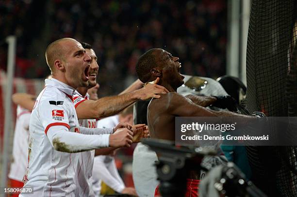 Anthony Ujah of Cologne celebrates after scoring his team's second goal during the Bundesliga match between 1. FC Koeln and Eintracht Braunschweig at...