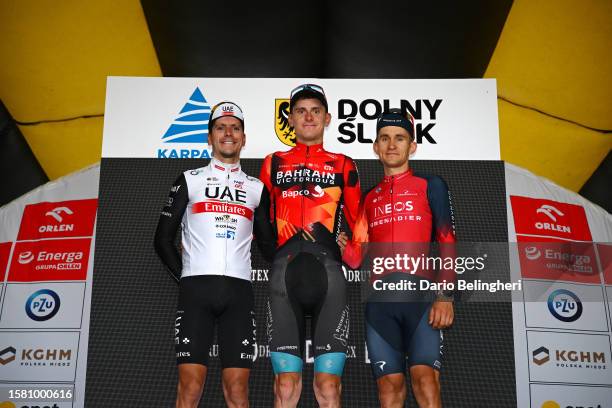 João Almeida of Portugal and UAE Team Emirates on second place, stage winner Matej Mohorič of Slovenia and Team Bahrain - Victorious and Michał...