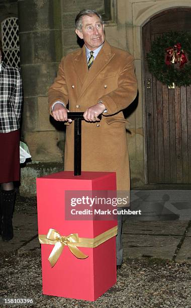 The Prince Of Wales Switches On The Christmas Tree Lights In The Village Of Ashover In Derbyshire. .