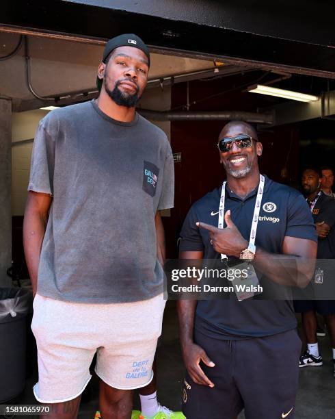 Jimmy Floyd Hasselbaink of Chelsea poses for the camera with Basketball player Kevin Durant of Phoenix Suns during the Premier League Summer Series...