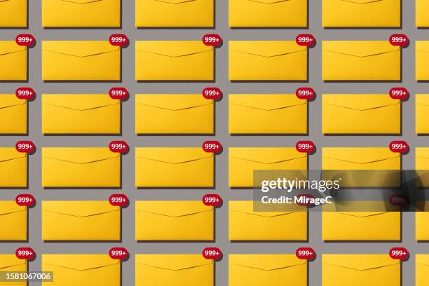 overload unread email notifications on yellow envelopes - abundance stock pictures, royalty-free photos & images