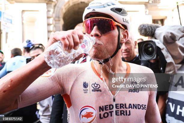 And exhausted 53 Dutch Mathieu van der Poel drinks water after winning the men elite road race at the UCI World Championships Cycling 1km from...