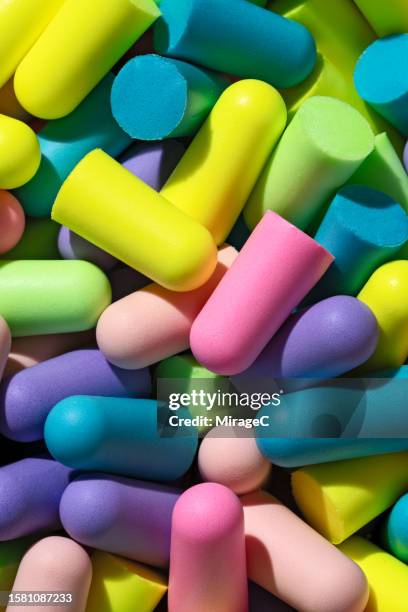 colorful ear plugs - ear plug ear protectors stock pictures, royalty-free photos & images