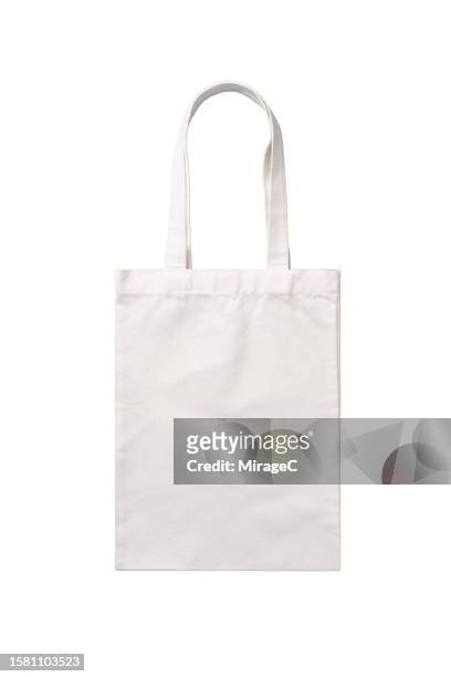 reusable blank white tote bag isolated on white - トートバッグ ストックフォトと画像