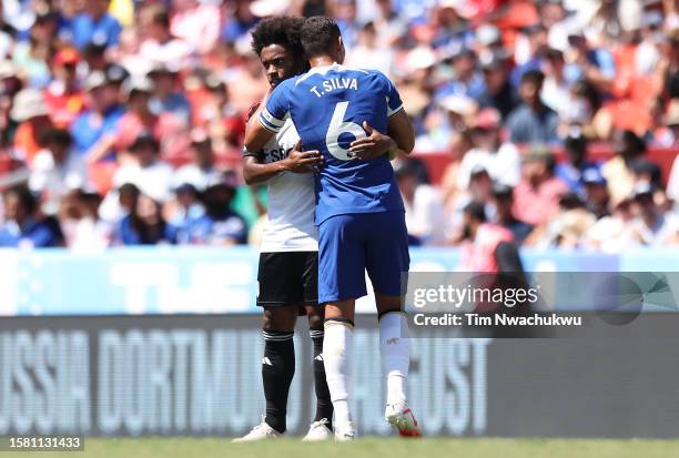 Thiago Silva of Chelsea and Willian of Fulham interact during the Premier League Summer Series match between Chelsea FC and Fulham FC at FedExField...