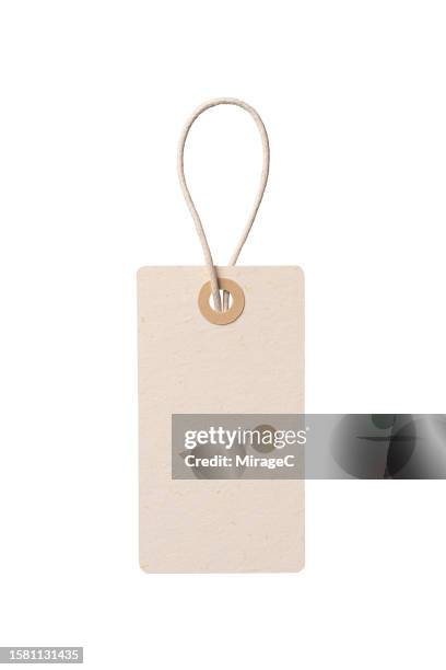 rectangle shape beige paper price tag with rope on white - labeling data stock pictures, royalty-free photos & images