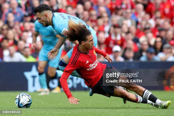 Manchester United's Tunisian midfielder Hannibal Mejbri is fouled by Athletic Bilbao's Spanish defender Aitor Paredes during the pre-season friendly...