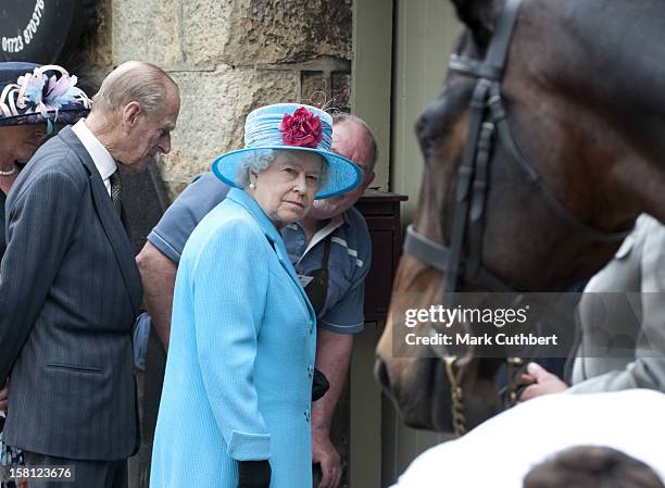 Her Majesty The Queen, Accompanied By The Duke Of Edinburgh View The Blacksmiths Shop In Cloughton.
