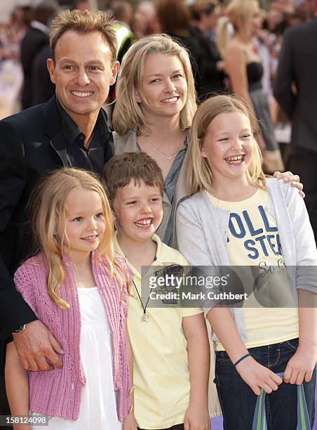 Jason Donovan And Angela Malloch Arriving At The Uk Film Premiere Of 'Hannah Montana' At The Odeon Leicester Square, London.