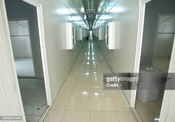 An empty corridor of the new isolation ward of the hospital erected in barely a week to house a rapidly increasing number of Chinese patients...