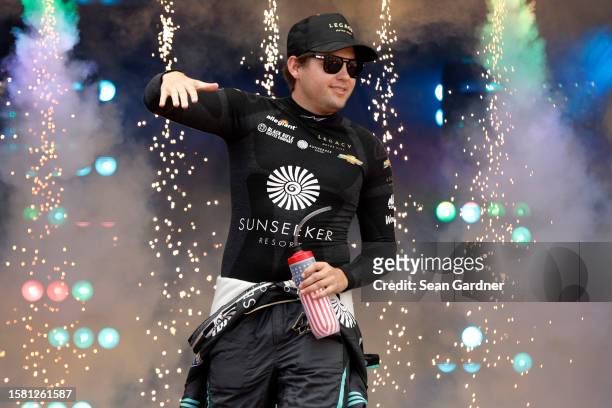 Noah Gragson, driver of the Sunseeker Resort Chevrolet, walks onstage during driver intros prior to the NASCAR Cup Series Cook Out 400 at Richmond...