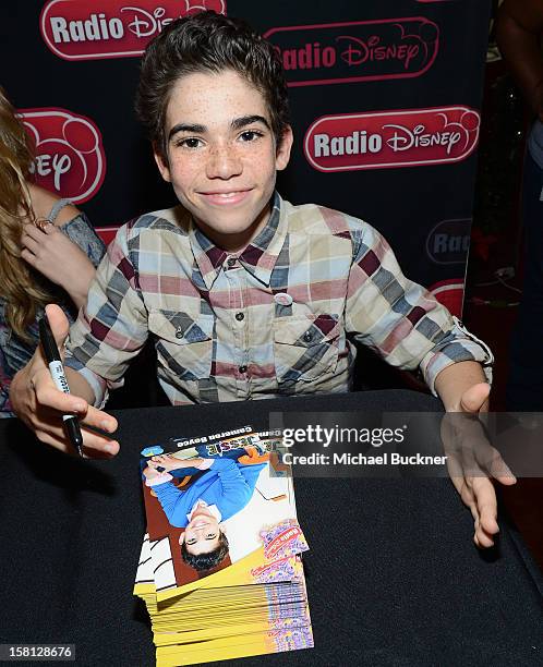 Cameron Boyce star of the hit series "Jessie" gets signs autographs for Radio Disney AM 1110 fans at the Wii U Showdown at Westfield Century City...