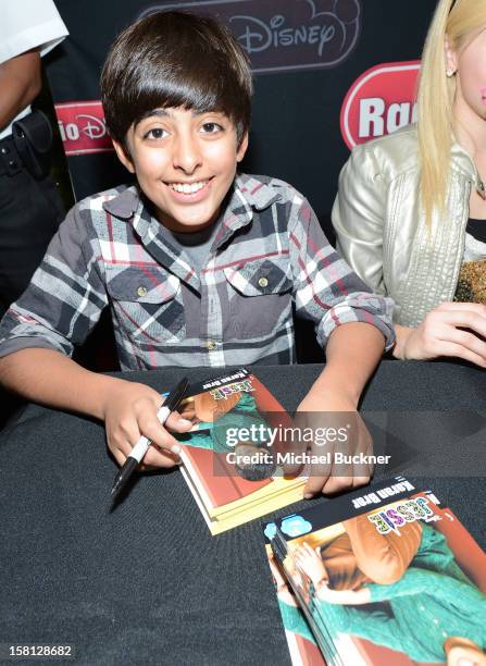 Karan Brar star of the hit series "Jessie" gets signs autographs for Radio Disney AM 1110 fans at the Wii U Showdown at Westfield Century City Mall...