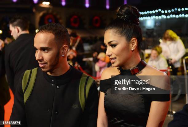 Nicole Scherzinger and Lewis Hamilton attend the world premiere of "Jack Reacher" at The Odeon Leicester Square on December 10, 2012 in London,...