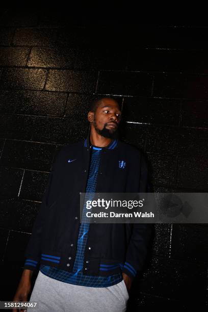 Kevin Durant of Phoenix Suns poses for a photo with the 2023/2024 Chelsea Away kit prior to the Premier League Summer Series match between Chelsea FC...