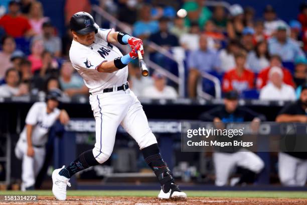 Avisaíl García of the Miami Marlins hits a single against the Detroit Tigers during the sixth inning at loanDepot park on July 30, 2023 in Miami,...