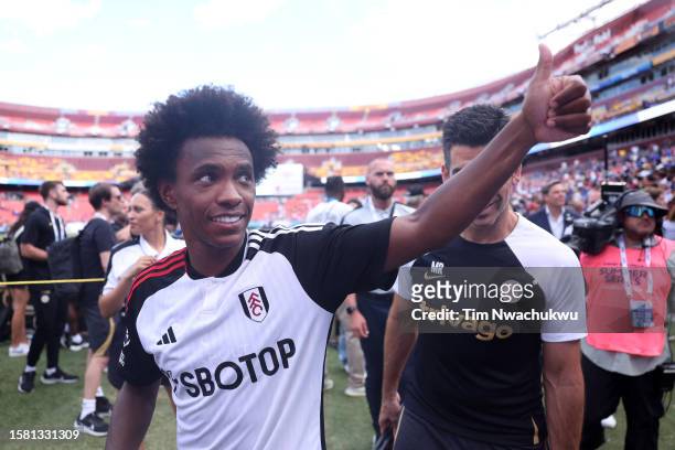 Willian of Fulham acknowledges the fans after the Premier League Summer Series match between Chelsea FC and Fulham FC at FedExField on July 30, 2023...