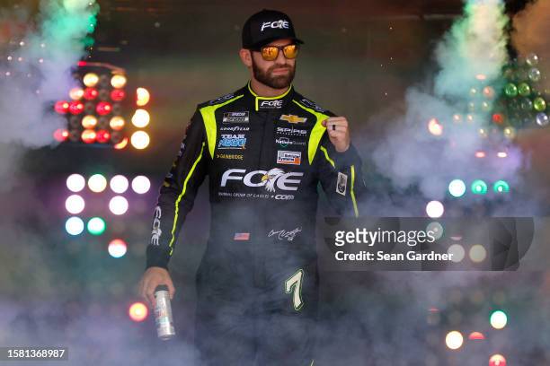 Corey LaJoie, driver of the FOE Chevrolet, walks onstage during driver intros prior to the NASCAR Cup Series Cook Out 400 at Richmond Raceway on July...