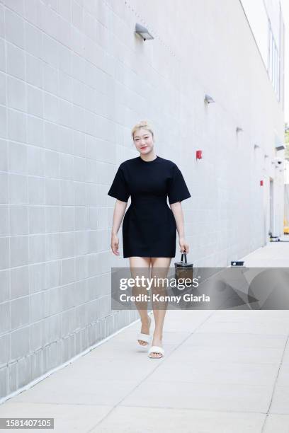 Li Meng of the Washington Mystics arrives at the arena before the game agains the Los Angeles Sparks on August 6, 2023 at Entertainment and Sports...