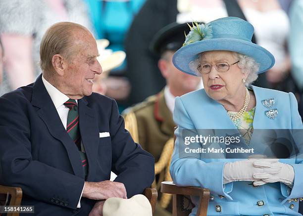 Queen Elizabeth Ii And The Prince Philip The Duke Of Edinburgh Watch A Flotilla Of Boats Celebrating The History Of The River Thames At The Henley...