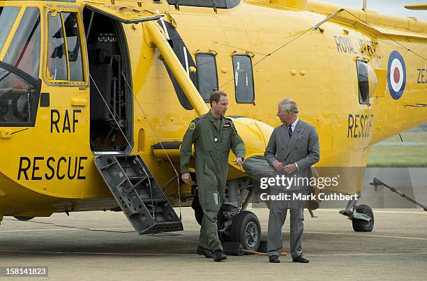 Prince William Shows Prince Charles The Sea King Helicopter He Flies During His Search And Rescue Missions From Raf Valley On Anglesey, Wales.