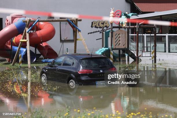 Car is submerged in water after the flood in Koruska, Slovenia on August 06, 2023. The flood, which has occurred in Slovenia in the last days,...