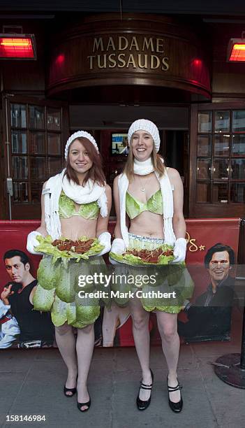 Peta'S Lettuce Ladies Crash 'Gaga Day' In Protest Of Lady Gaga Wearing A Meat Dress At The Mtv Video Music Awards Outside The Lady Gaga Wax Unveiling...