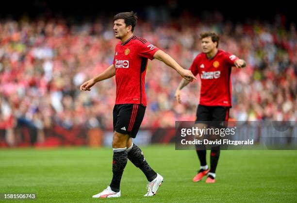 Dublin , Ireland - 6 August 2023; Harry Maguire of Manchester United, left, and Victor Lindelöf during the pre-season friendly match between...