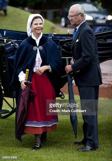 King Carl Xvi Gustaf Of Sweden And Queen Silvia Of Sweden Arrive In A Carriage To The Princess Victoria Of Sweden'S Birthday Concert In Borgholm On...