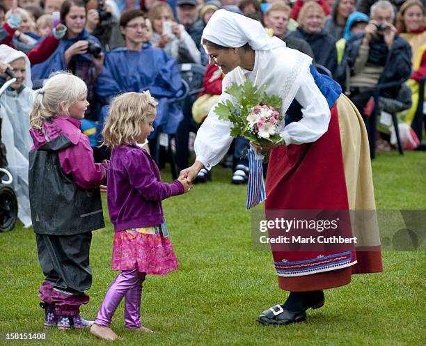 Princess Victoria Of Sweden Greets Children In Traditional Dress As She Celebrates Her 34Th Birthday At A Concert In Borgholm On Oland.
