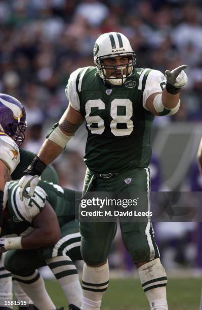 Center Kevin Mawae of the New York Jets on the gives directions before the snap during the NFL game against the Minnesota Vikings on October 20, 2002...
