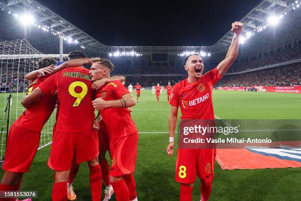 Players of FCSB celebrates the goal scored by Andrea Compagno during the SuperLiga Round 4 match between FCSB and CFR Cluj at Stadionul Steaua on...