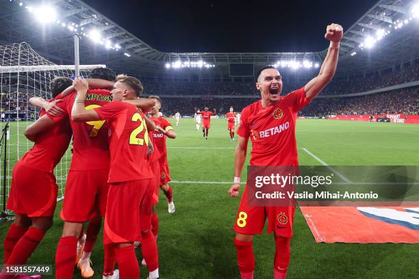 Players of FCSB celebrates the goal scored by Andrea Compagno during the SuperLiga Round 4 match between FCSB and CFR Cluj at Stadionul Steaua on...