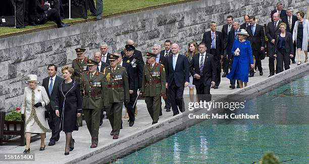 Queen Elizabeth Ll And Duke Of Edinburgh Accompanied By President And Dr Mcaleese, Visit The Garden Of Rembrance In Dublin During The State Visit To...