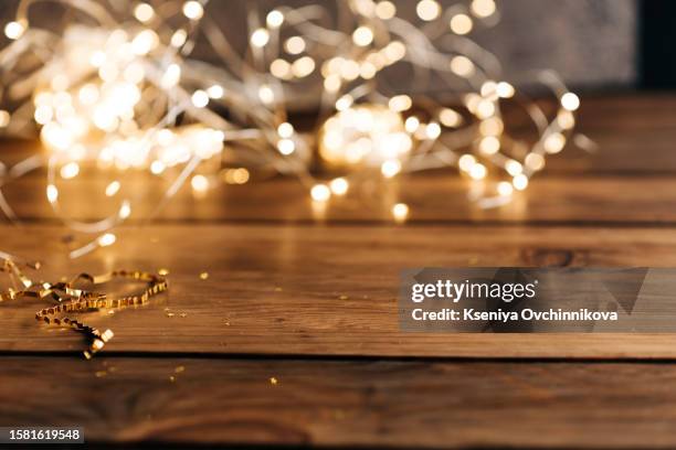 empty table in front of christmas tree with decorations background. for product display montage - vintage desktop wallpaper stock pictures, royalty-free photos & images