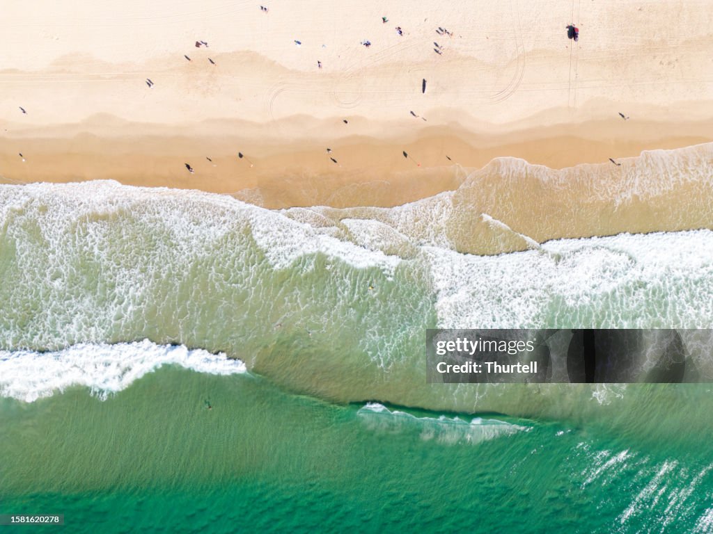 Breaking Waves On The Beach