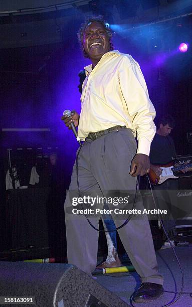 Mandawuy Yunupingu performs live on stage with the band Yothu Yindi at the 6th Annual Deadly Awards at City Live on October 22, 2000 in Sydney,...