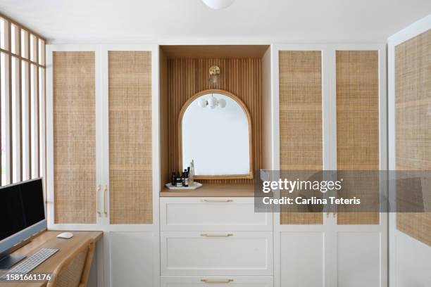 built-in cabinetry and dressing table in a bedroom - dressing table stock pictures, royalty-free photos & images