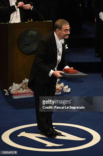 Nobel Prize in Physics laureate Professor Serge Haroche of France poses after he received his Nobel Prize from King Carl XVI Gustaf of Sweden during...