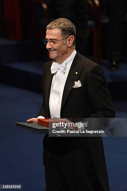 Nobel Prize in Physics laureate Professor Serge Haroche of France walks back to his seat after he received his Nobel Prize from King Carl XVI Gustaf...