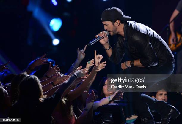 Singer Luke Bryan performs onstage during the 2012 American Country Awards at the Mandalay Bay Events Center on December 10, 2012 in Las Vegas,...