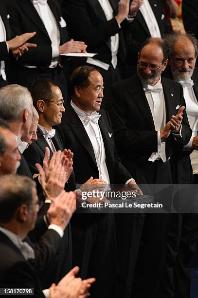 Nobel Prize in Medicine laureate Professor Shinya Yamanaka of Japan and Nobel Prize in Literature laureate, author Mo Yan of China attend the 2012...