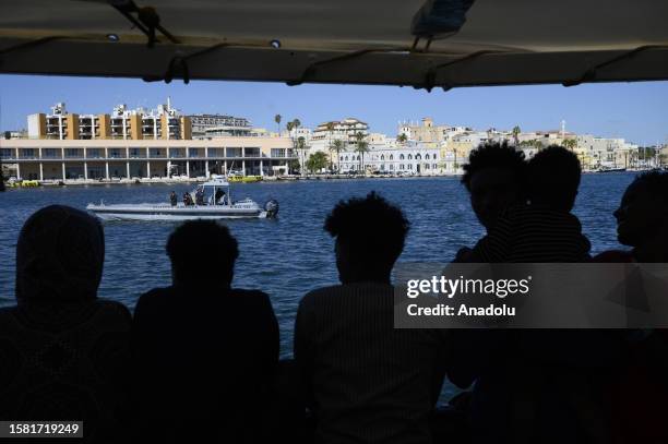 Migrants of different nationalities, 50 of which are unaccompanied, departed from Tunisia arrive at Brindisi after being rescued by the Spanish NGO...