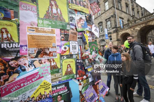 Street entertainers and tourists take to the Royal Mile during the Edinburgh Fringe Festival and Edinburgh International Festival on August 6, 2023...