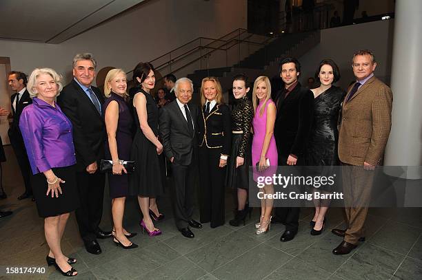 The cast and crew of "Downton Abbey" pose with Ralph Lauren at an evening with the cast and producers of PBS Masterpiece series "Downton Abbey"...