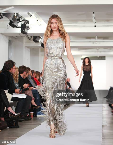 Model wearing Oscar de la Renta walks the runway during the Oscar de la Renta Pre-Fall 2013 Collection on December 10, 2012 in New York City.