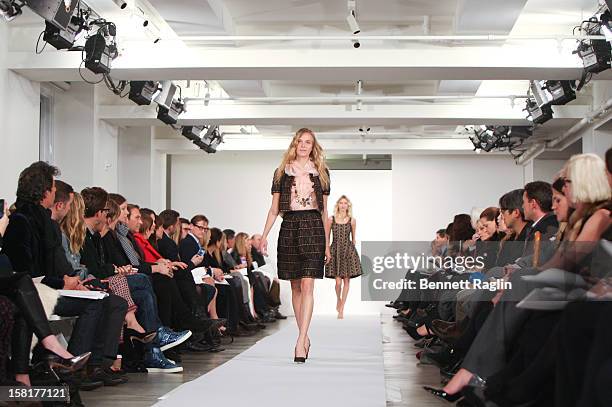 Model wearing Oscar de la Renta walks the runway during the Oscar de la Renta Pre-Fall 2013 Collection on December 10, 2012 in New York City.