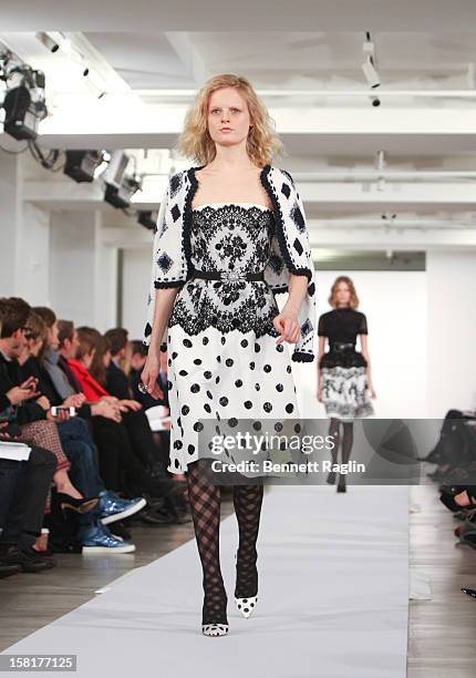 Model wearing Oscar de la Renta walks the runway during the Oscar de la Renta Pre-Fall 2013 Collection on December 10, 2012 in New York City.