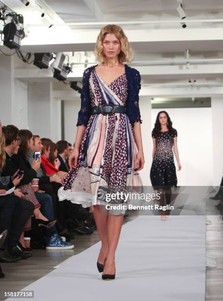 Model wearing Oscar de la Renta walks the runway during the Oscar de la Renta Pre-Fall 2013 Collection on December 10, 2012 in New York City.