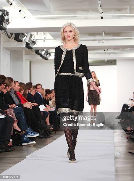 Model wearing Oscar de la Renta walks the runway during the Oscar de la Renta Pre-Fall 2013 Collection on December 10, 2012 in New York City.